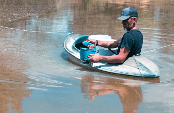 When your earth dam is leaking, apply DAMFIX to the surface of the water to seal the leak